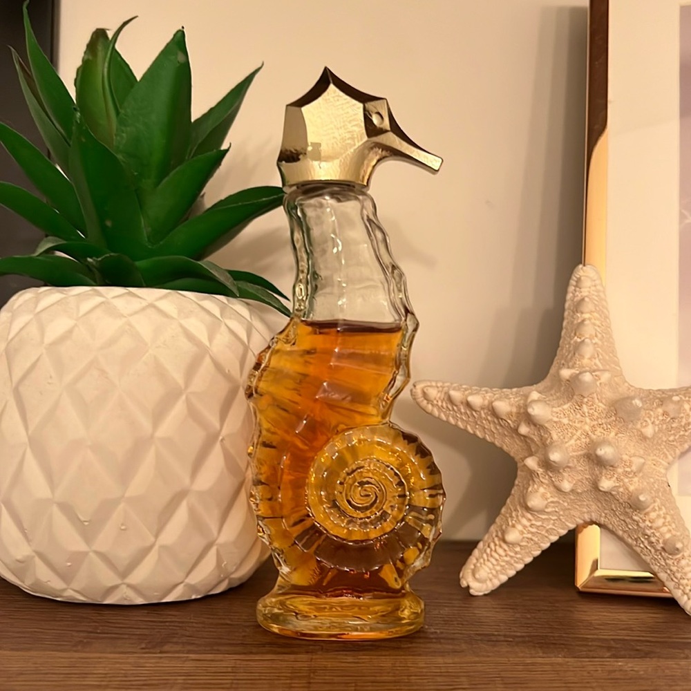VINTAGE AVON Sea Horse Miniature Bird of Paradise cologne. 3/4 full! 1.5oz